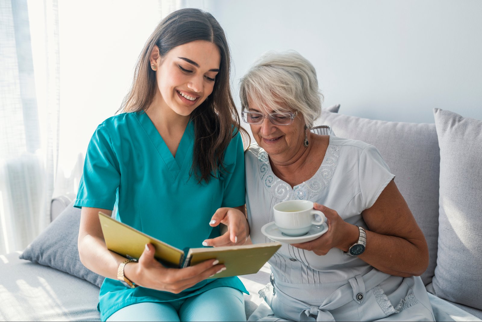 Companion spending time with an older adult at home